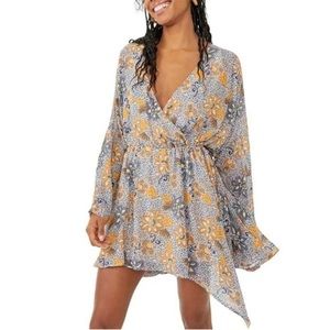 Free People Floral Teegan mini dress dress with v-neck. NWT size small.